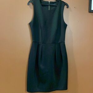 Dynamite ladies dress in size medium sheath style in black stretchy fabric.